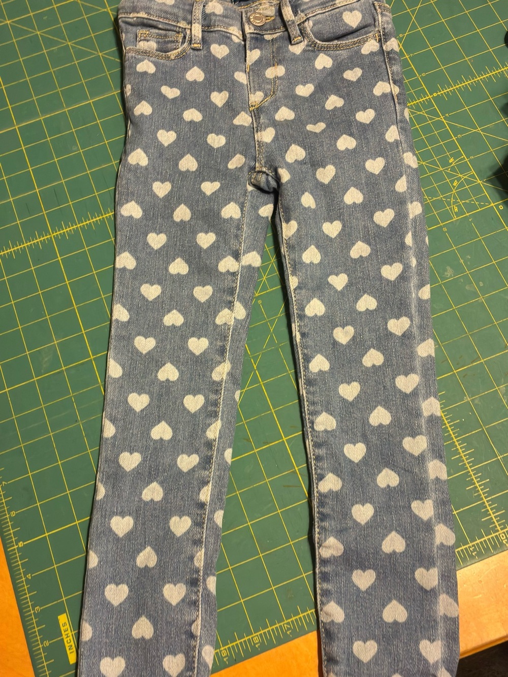 Old Navy Blue Denim Skinny Jeans with White Heart Print